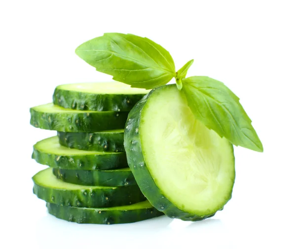 Sliced fresh cucumber with basil, isolated on white — Stock Photo, Image