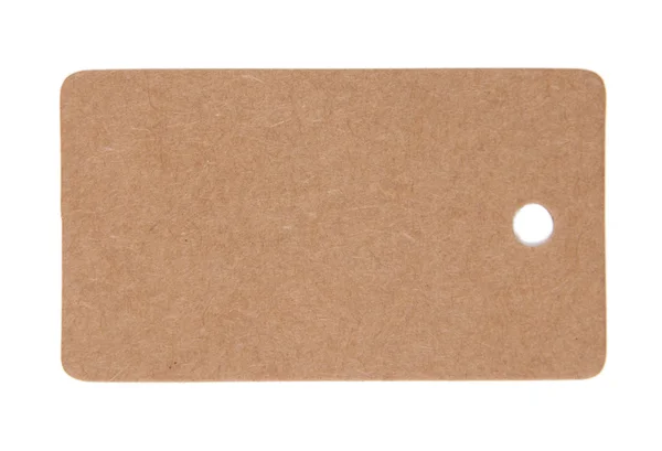 白で隔離される茶色のタグ — ストック写真