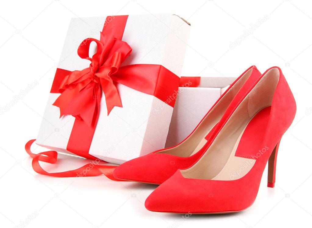 Beautiful red female shoes and gift box, isolated on white