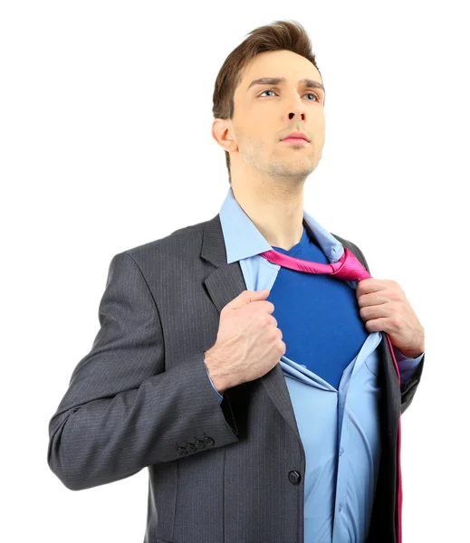 Jovem homem de negócios rasgando sua camisa revelando terno de super-herói, isolado em branco — Fotografia de Stock