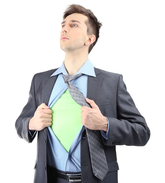 Joven hombre de negocios desgarrando su camisa revelando traje de superhéroe, aislado en blanco — Foto de Stock
