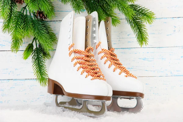 Figure skates on wooden background — Stock Photo, Image