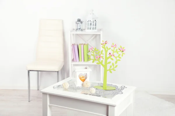 Decorative tree with decorative bows, on table on home interior background — Stock Photo, Image