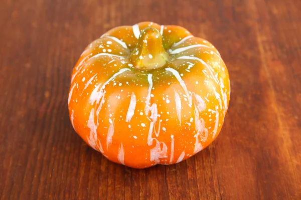 Small pumpkin on wooden background — Stock Photo, Image