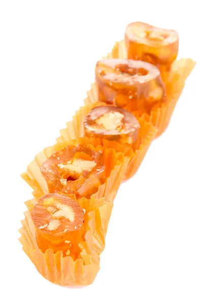 Leckere orientalische Süßigkeiten (churchkhela), isoliert auf weiß — Stockfoto