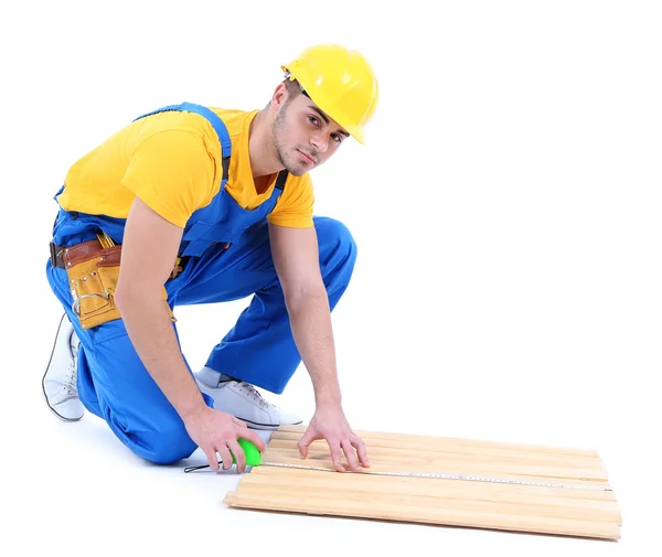 Trabajador joven aislado en blanco — Foto de Stock