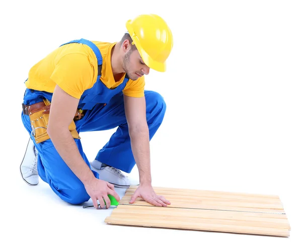 Trabajador joven aislado en blanco — Foto de Stock