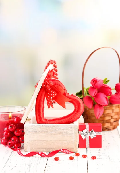 Romantic still life with heart in wooden casket — Stock Photo, Image