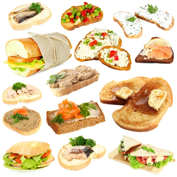 Smaczne kanapki na białym tle — Zdjęcie stockowe