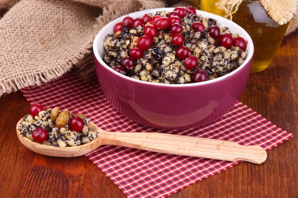 Bowl with kutia - traditional Christmas sweet meal in Ukraine, Belarus and Poland, on wooden background — Stock Photo, Image