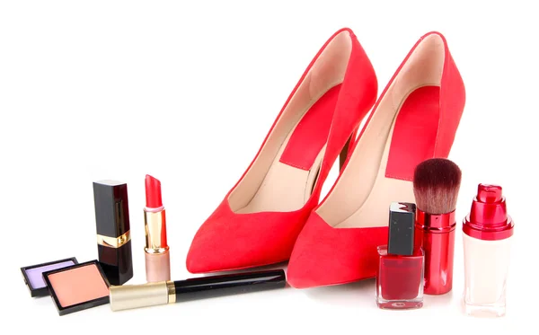 Beautiful red female shoes with cosmetics, isolated on white — Stock Photo, Image