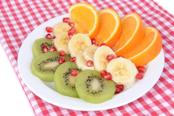 Sweet fresh fruits on plate on table close-up — Stock Photo, Image