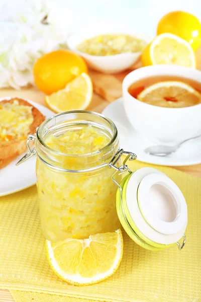 Tasty lemon jam on table close-up — Stock Photo, Image