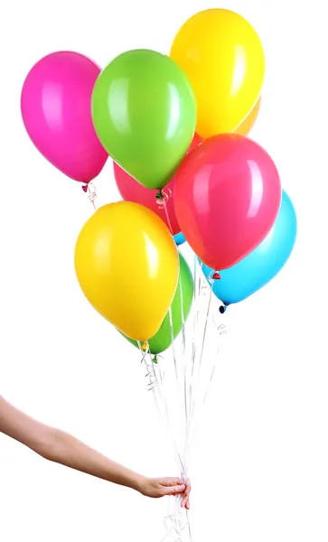 Mano sostiene globos de colores aislados en blanco — Foto de Stock