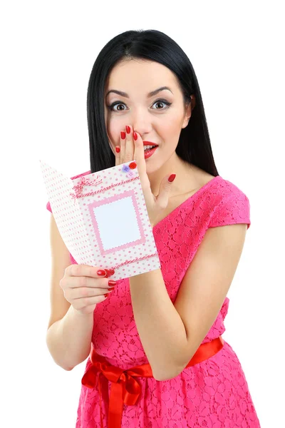 Приваблива молода жінка з листівкою Валентина ізольована на білому — стокове фото