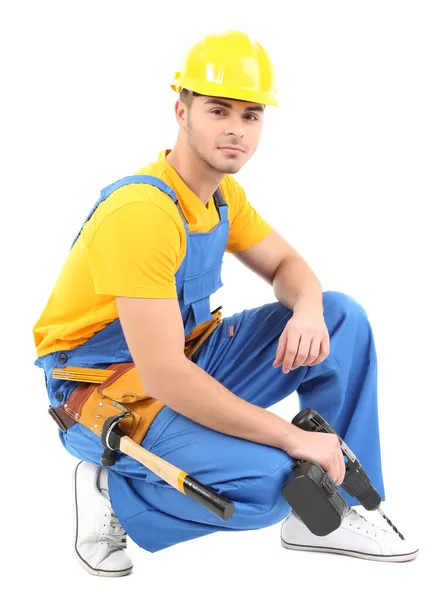 Construtor masculino em capacete amarelo isolado em branco — Fotografia de Stock