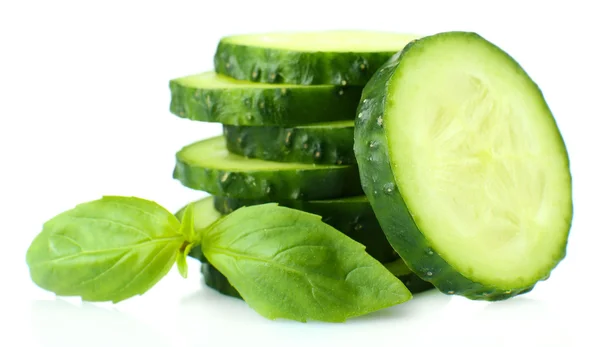 Sliced fresh cucumber with basil, isolated on white — Stock Photo, Image