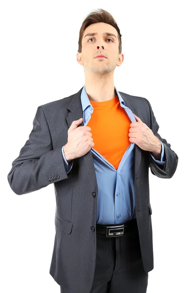 Giovane uomo d'affari lacerando la camicia rivelando abito supereroe, isolato su bianco — Foto Stock