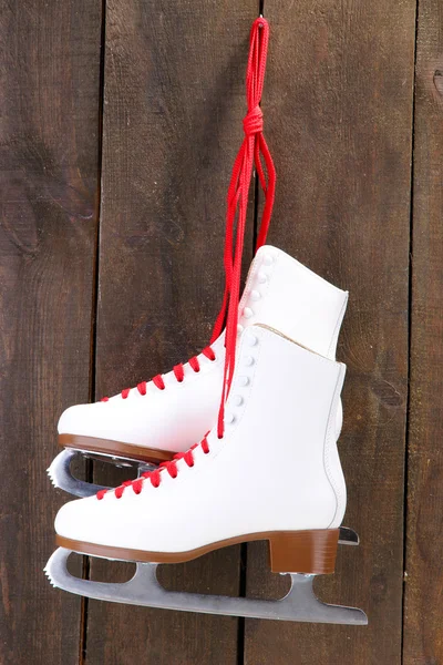 Figure skates on wooden background — Stock Photo, Image