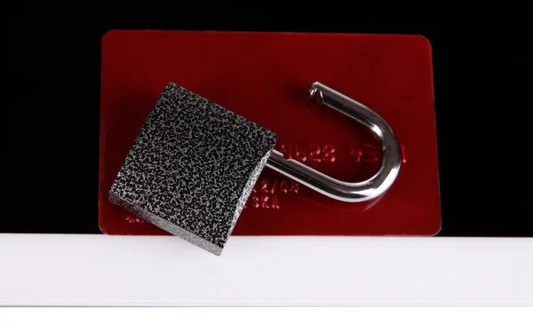 Credit card with lock and tablet close up — Stock Photo, Image