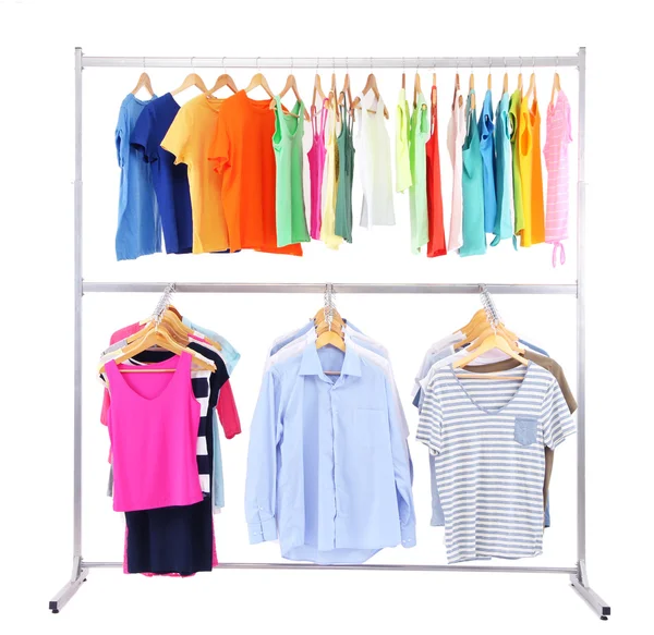 Different clothes on hangers, on gray background — Stock Photo, Image