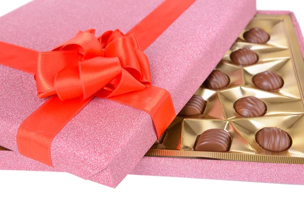 Delicious chocolates in box close-up Stock Photo