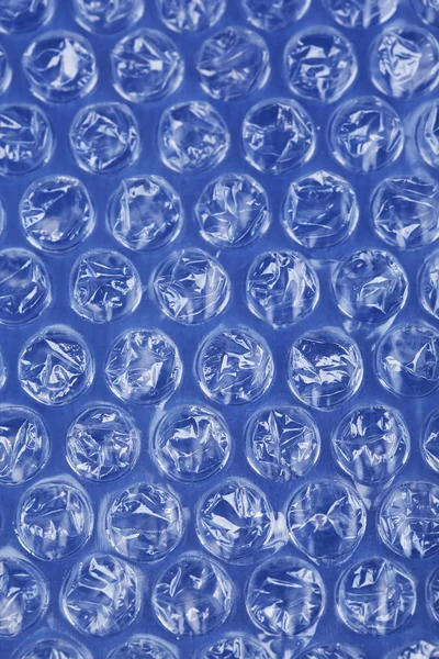 Färg plast bubbla förpackningsmaterial, närbild — Stockfoto