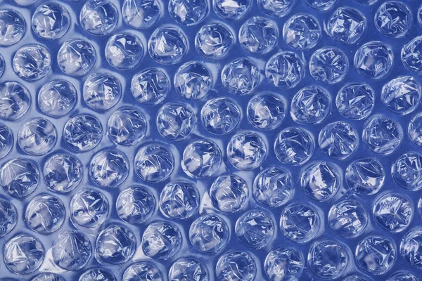 Material plástico del embalaje de la burbuja del color, primer plano — Foto de Stock