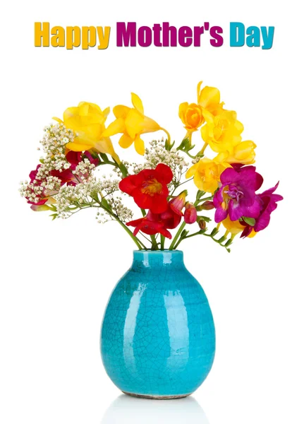 Beautiful bouquet of freesia in blue vase isolated on white — Stok fotoğraf