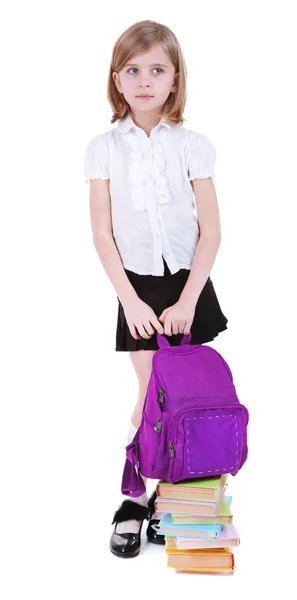 Beautiful little girl holding backpack isolated on white — Stock Photo, Image