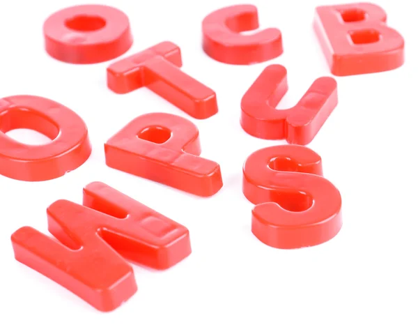 Bunte magnetische Buchstaben isoliert auf weiß — Stockfoto