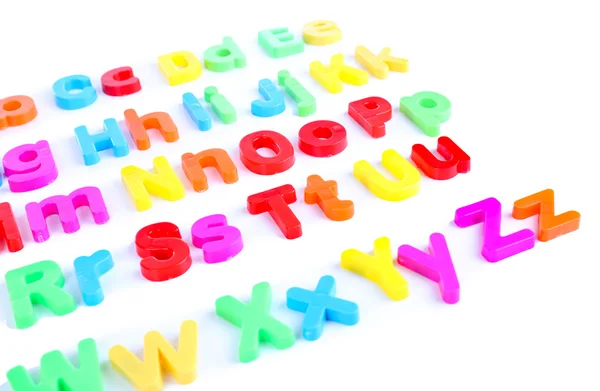 Colorful magnetic letters isolated on white — Stock Photo, Image