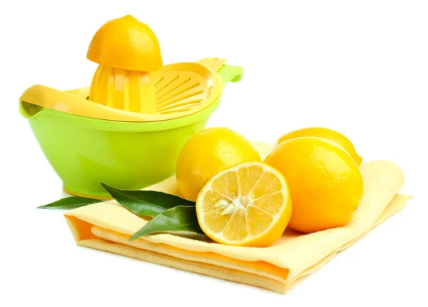 Citrus press and lemons isolated on white — Stock Photo, Image