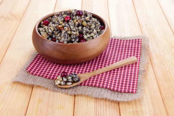 Plate with kutia - traditional Christmas sweet meal in Ukraine, Belarus and Poland, on wooden background — Stock Photo, Image