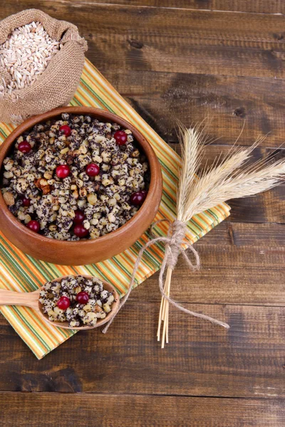 Plate with kutia - traditional Christmas sweet meal in Ukraine, Belarus and Poland, on wooden background — Stock Photo, Image