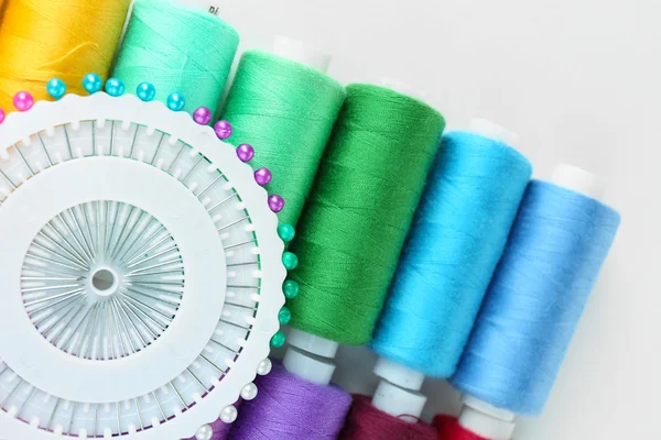 Colored spools of threads close up — Stock Photo, Image