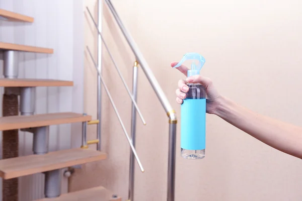 Sprayed air freshener in hand close-up — Stock Photo, Image