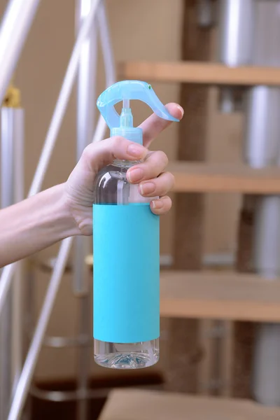 Sprayed air freshener in hand close-up — Stock Photo, Image