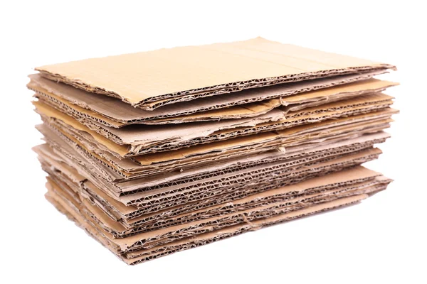 Stack of cardboard for recycling isolated on white — Stock Photo, Image