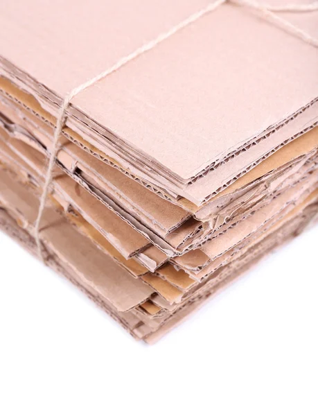 Stack of cardboard for recycling isolated on white — Stock Photo, Image