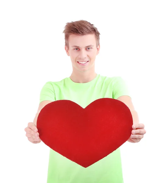 Handsome young man with big red heart, isolated on white — Stock Photo, Image