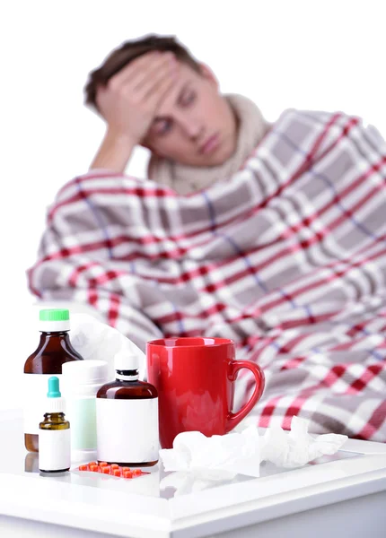 Guy wrapped in plaid sitting on sofa is ill — Stock Photo, Image