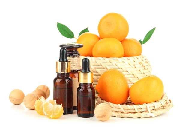 Tangerine essential oil and tangerines, isolated on white — Stock Photo, Image