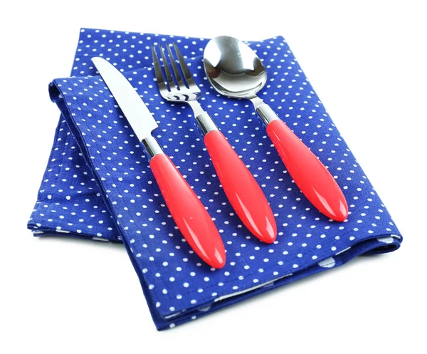 Kitchen cutlery on color napkin isolated on white — Stock Photo, Image