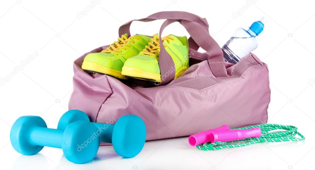 Sports bag with sports equipment isolated on white