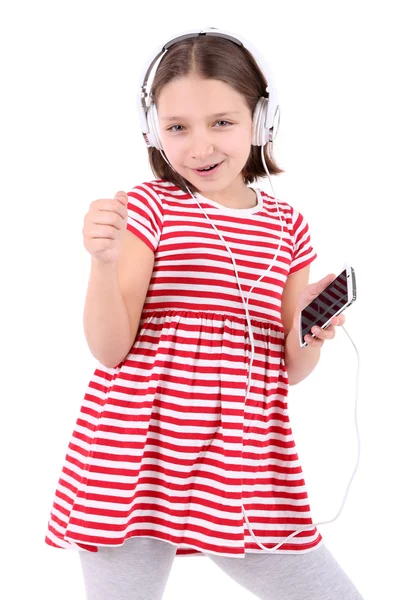 Beautiful little girl listening to music, isolated on white — Stock Photo, Image