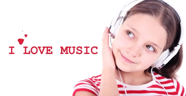 Красивая маленькая девочка слушает музыку, изолированная на белом — стоковое фото