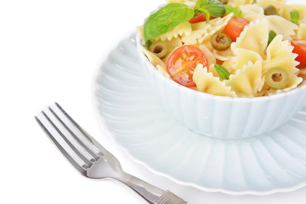 Delicious pasta with tomatoes on plate isolated on white — Stock Photo, Image