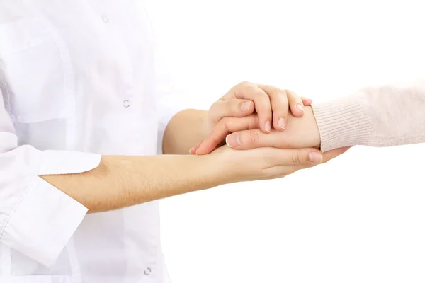 Tıp doktoru hastanın elini tutarak üzerine beyaz izole — Stok fotoğraf