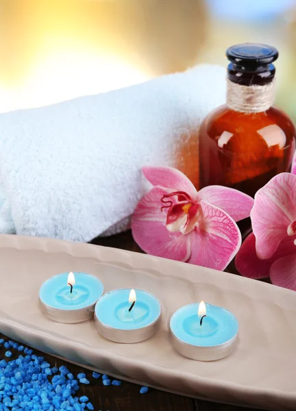 Beautiful spa setting with flower on bright background — Stock Photo, Image